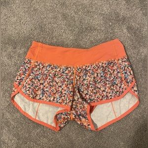 Orange and Multicolor floral Lululemon shorts
